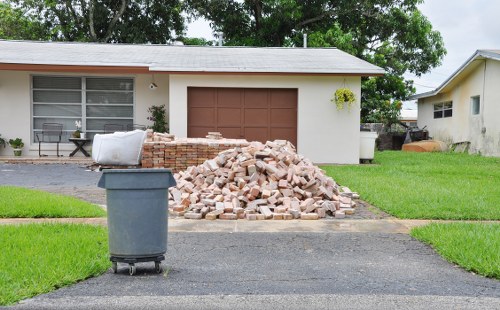 Workers managing construction debris